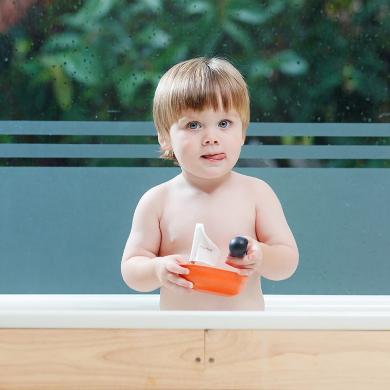 Plan Toys - Jouet de bain - Bateau garde côtière - Le Petit Zèbre