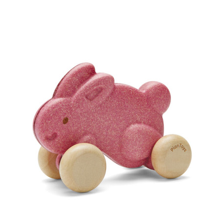 Plan Toys - Lapin en bois à roulettes - Rose